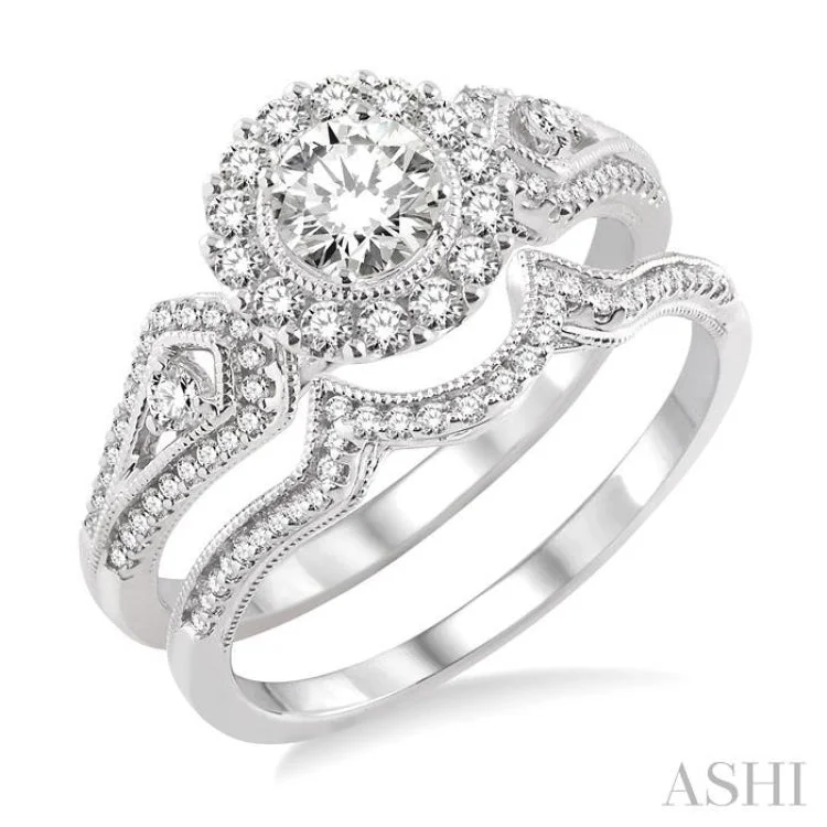 3/4 Ctw Diamond Wedding Set with 5/8 Ctw Round Cut Engagement Ring and 1/10 Ctw Wedding Band in 14K White Gold